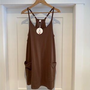 Size L romper, dress with shorts under . Never worn.